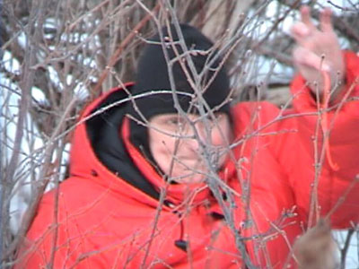 tourangeau holding orange string